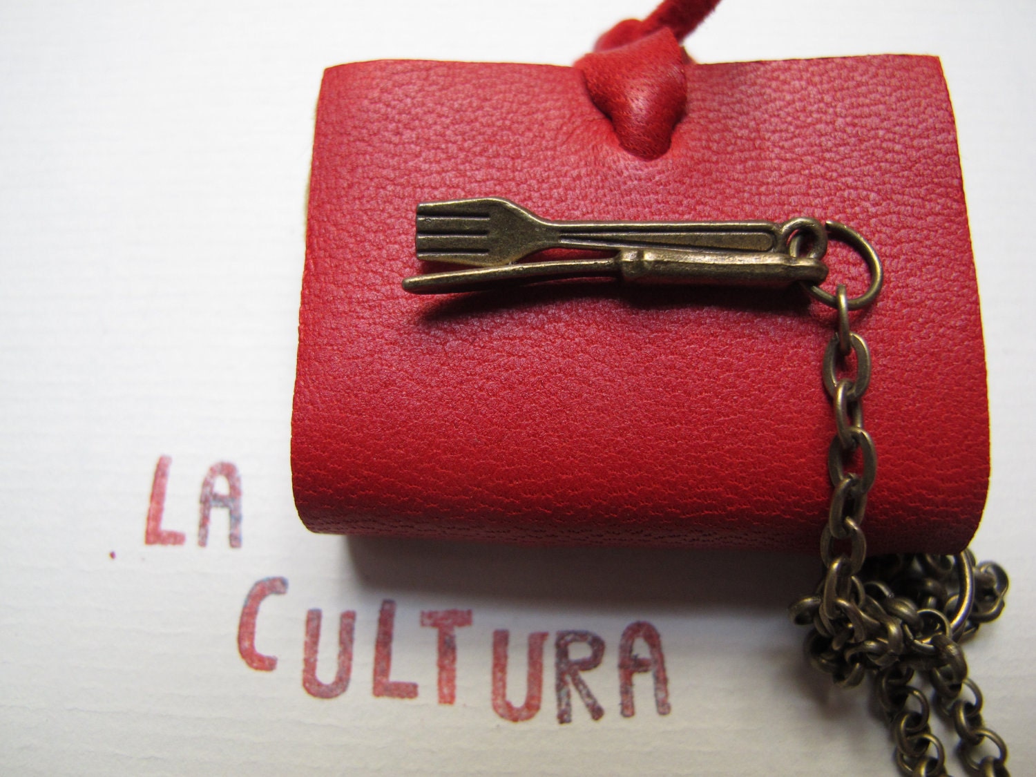 Eat your books, eat your culture, mini book necklace