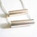 Modern silver necklace. Layered silver necklace with two tiers of silver plated chain.
