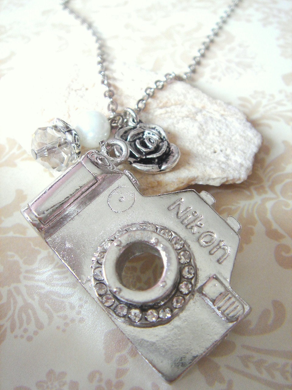 Snapshots. Camera necklace with rose charm (Rhodium plated)