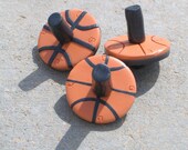 Basketball dreidel or spinning top