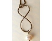 Blackened sterling silver figure 8 necklace with freshwater pearl dangle
