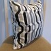 Decorative Pillow Cover, 18" x 18" in  Tan, Black,Stone, Pewter and Charcoal Gray on an Ivory Background.