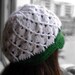 Crocheted white and emerald green Beret