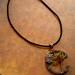 Who is There a  Wire Tree with Brass Owl Industrial Necklace