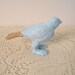 sparrow paperweight, pale blue