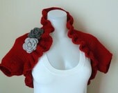 Red shrug with removable brooches