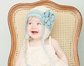 2T-4T size cream earflap beanie with teal stripes and flower