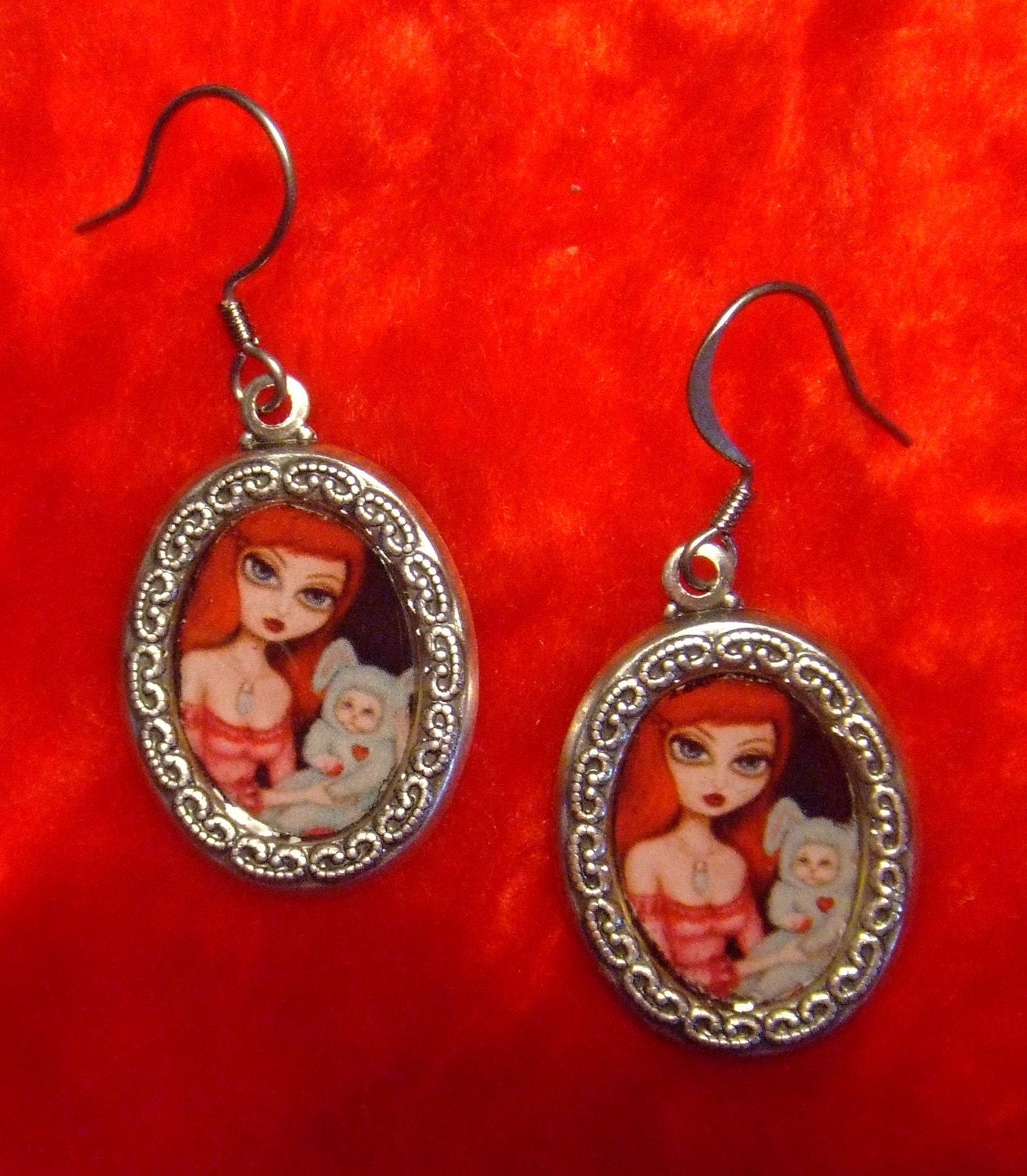 LUCKY victorian gothic big eye red head holding a blue bunny rabbit sterling plated earrings by Nina Friday