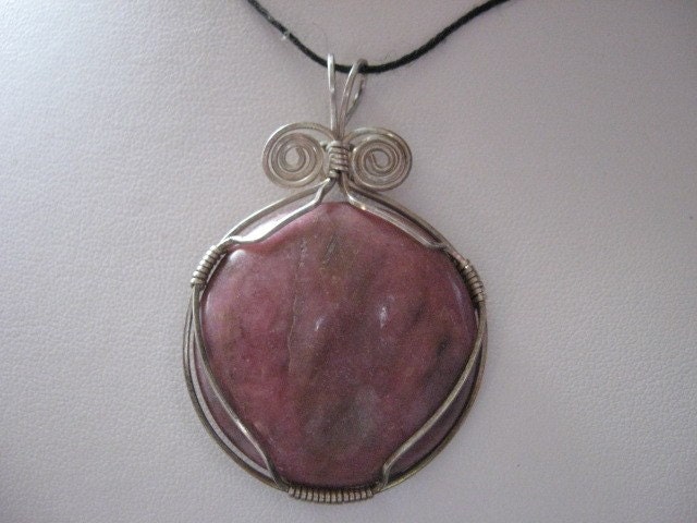 Lovely Rhodonite wrapped in sterling silver pendant