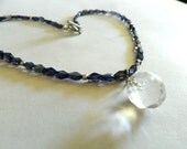 Beautiful mysterious iolite with lead crystal ball center piece
