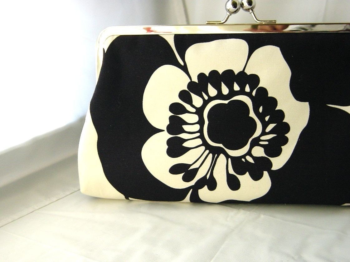 Delia- Elegant black and white clutch lined in red dupioni silk