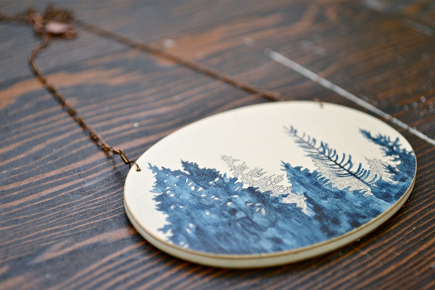 Tree Line Vignette Necklace - large hand painted blue and white wooden pendant on copper chain