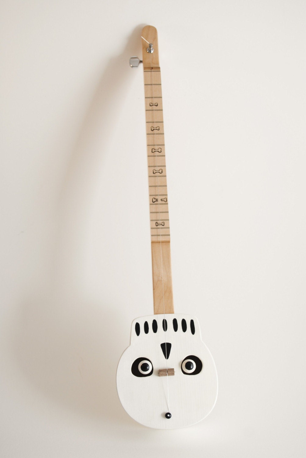 The Skull   --1,2,or 3 string--