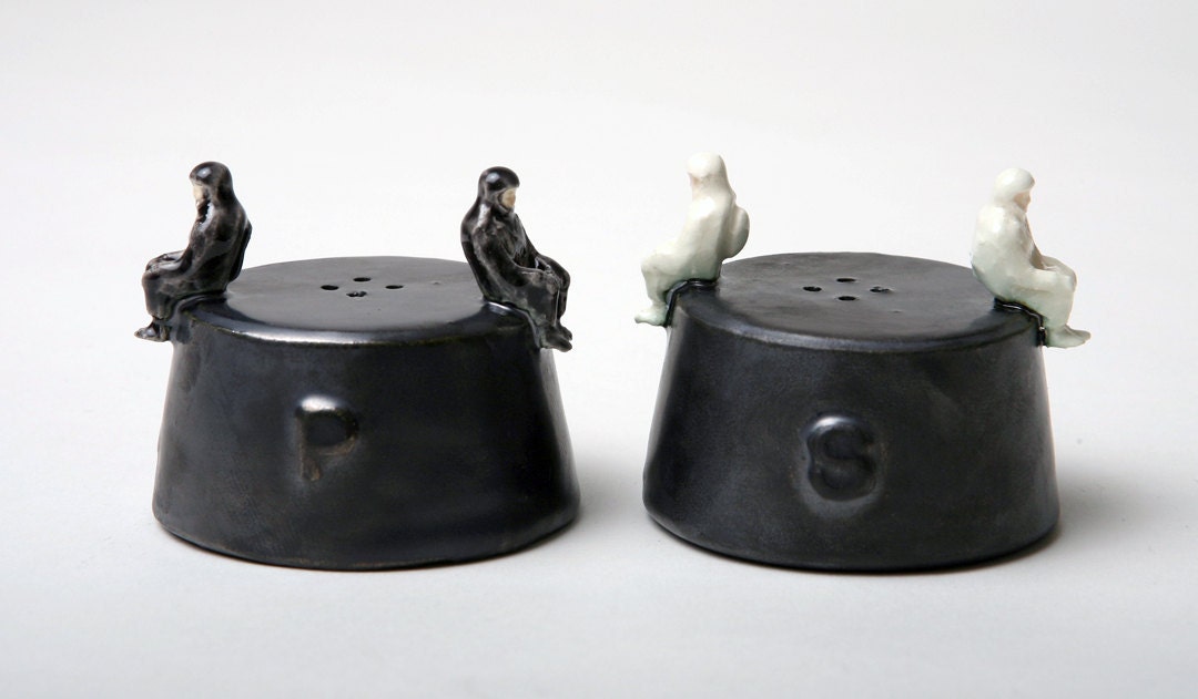 Ceramic Astronauts on Nose Cone Salt and Pepper Shakers