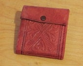 Vintage embossed leather wallet.