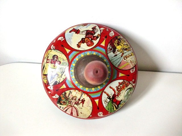 SPIN AROUND. French antique. Metal. Fairy tale illustrations.