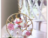 Sakura Season II Necklace made with pretty flowers, swarovski crystals, a cute porcelain kitten etc.