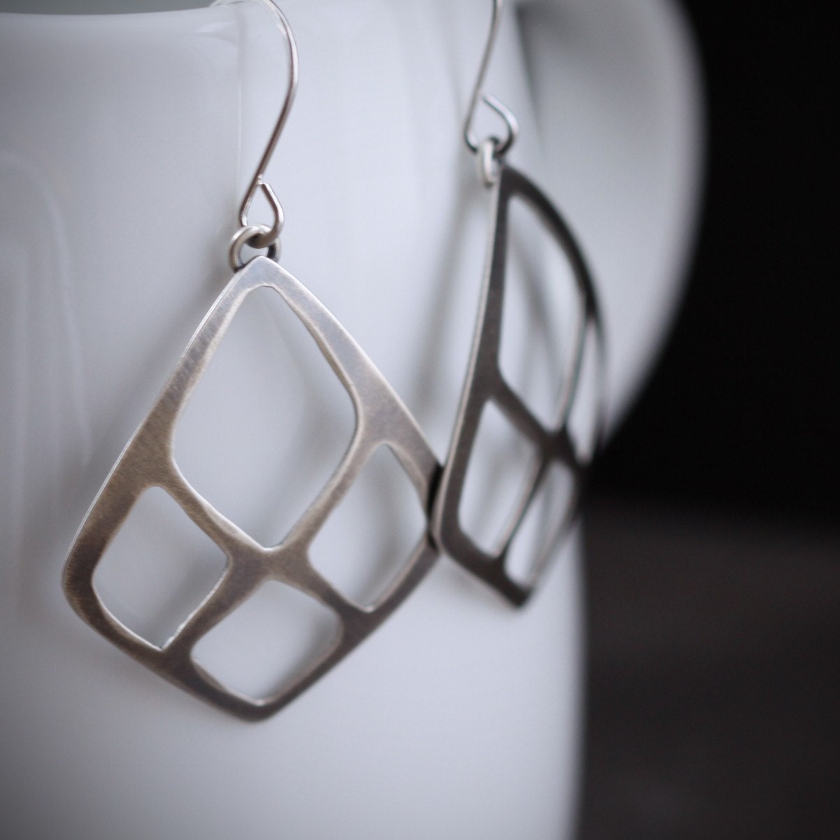 Lightweight silver earrings in a diamond shape with cutouts and a modern gunmetal gray finish crafted by an artisan - "Arcadian Earrings"