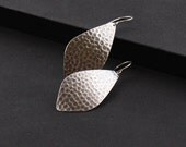 Handmade sterling silver earrings with a streamlined yet unique outer leaf shape and a distinctive hammered pattern - "La Hoja Earrings"