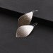 Handmade sterling silver earrings with a streamlined yet unique outer leaf shape and a distinctive hammered pattern - "La Hoja Earrings"