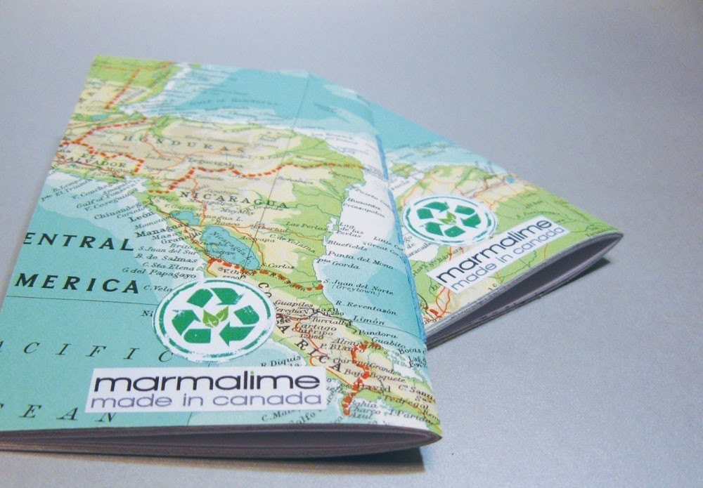 2 notebooks made with post-consumer, reused, rescued, and found papers