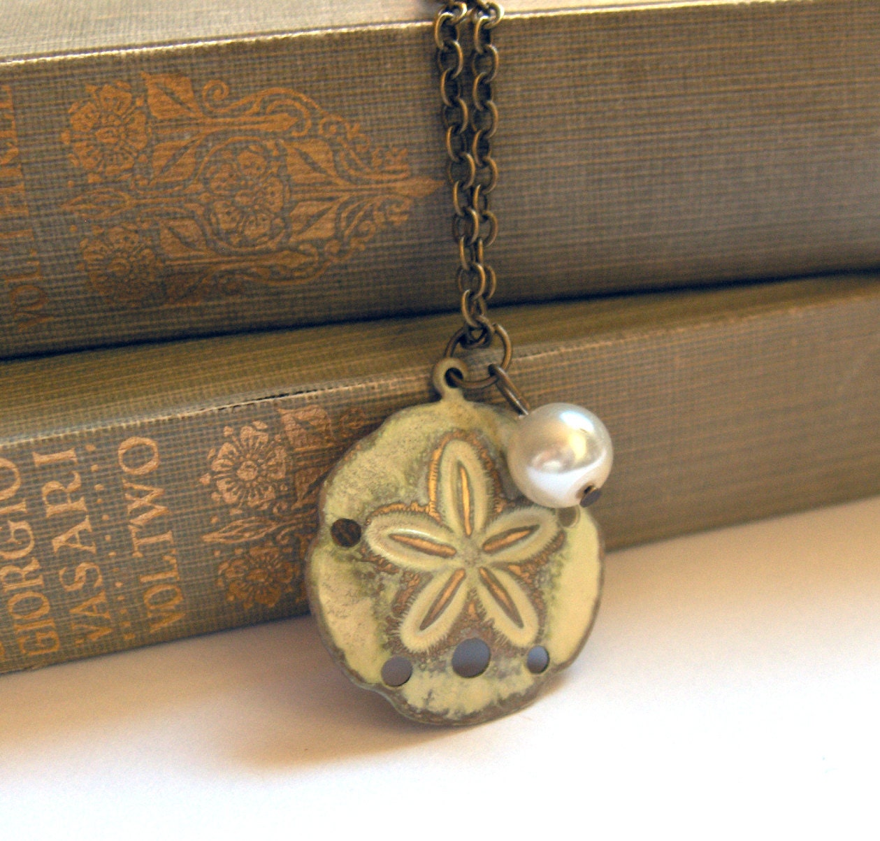 Creamy Antique White Sand Dollar Brass Necklace with Pearly Bead