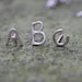 Alphabet letter stud earrings in Sterling Silver