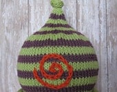 Wild Child Green and Purple striped baby hat with orange energy swirl
