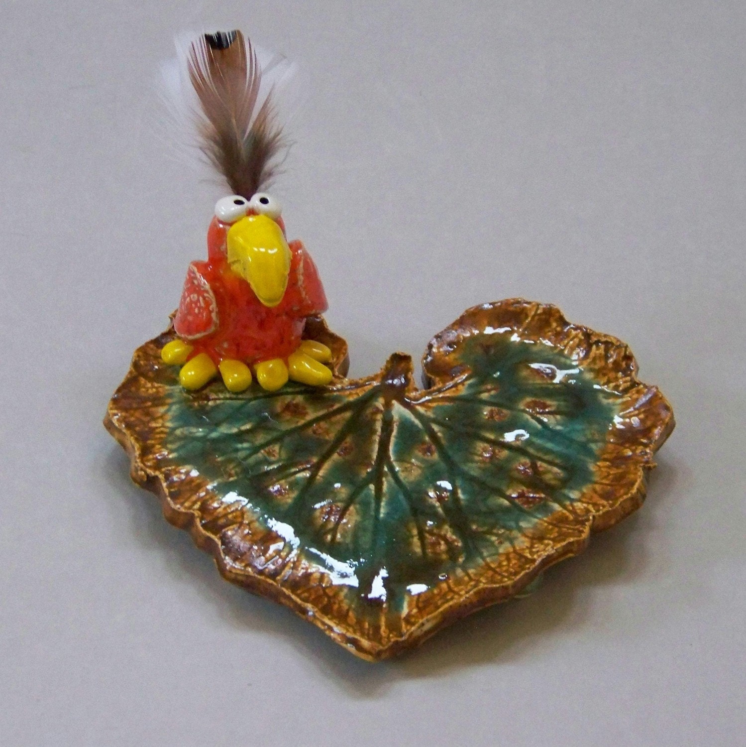 Ceramic Decorative Green Leaf Plate with Orange and Yellow Bird Item - 1002