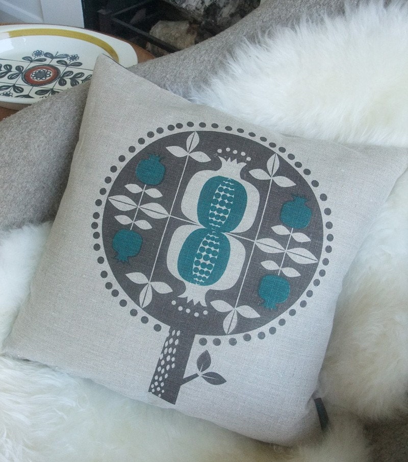 Pomegranate tree cushion in teal on natural linen