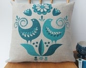 Happy birds cushion in teal on natural linen