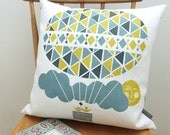 Ballooning cushion on white linen