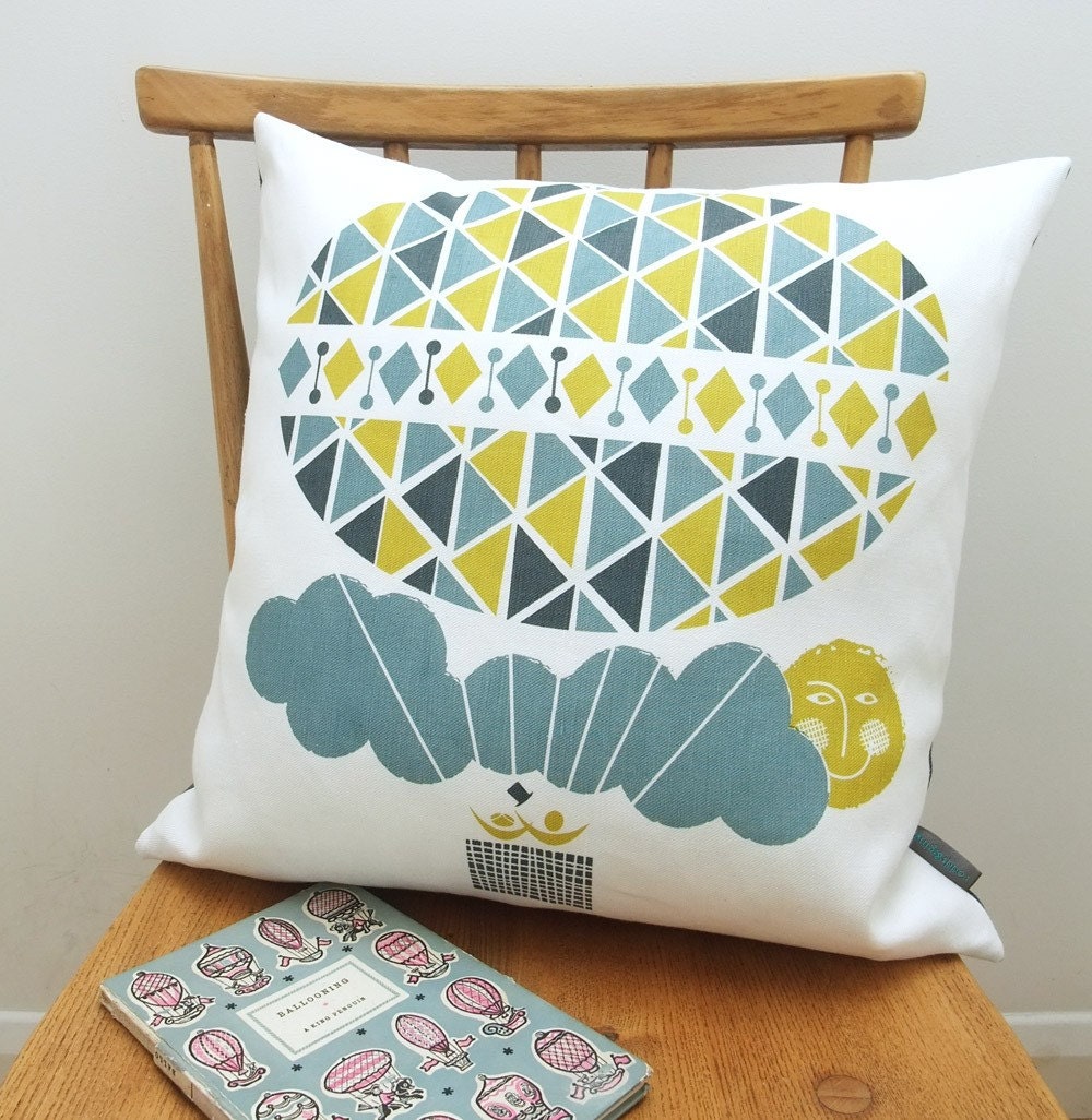 Ballooning cushion on white linen