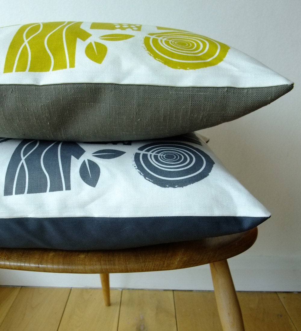 Log pile cushion on white linen