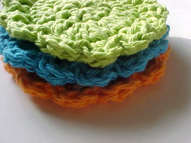 3 bright and beautiful facial scrubbies, hot orange, hot blue and hot green