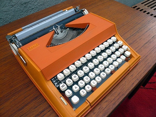 Reserved for Kathy - Orange Olivetti Typewriter PROFESSIONALLY SERVICED including new rubber platten