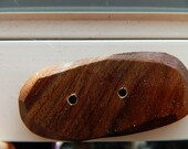 Apple Wood Button, approx.  3 in x 1 in oblong