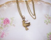Little gold necklace. Bird charm necklace. Custom Czech glass bead color. Bronze jewelry, antiquated gold. Best friend gift.