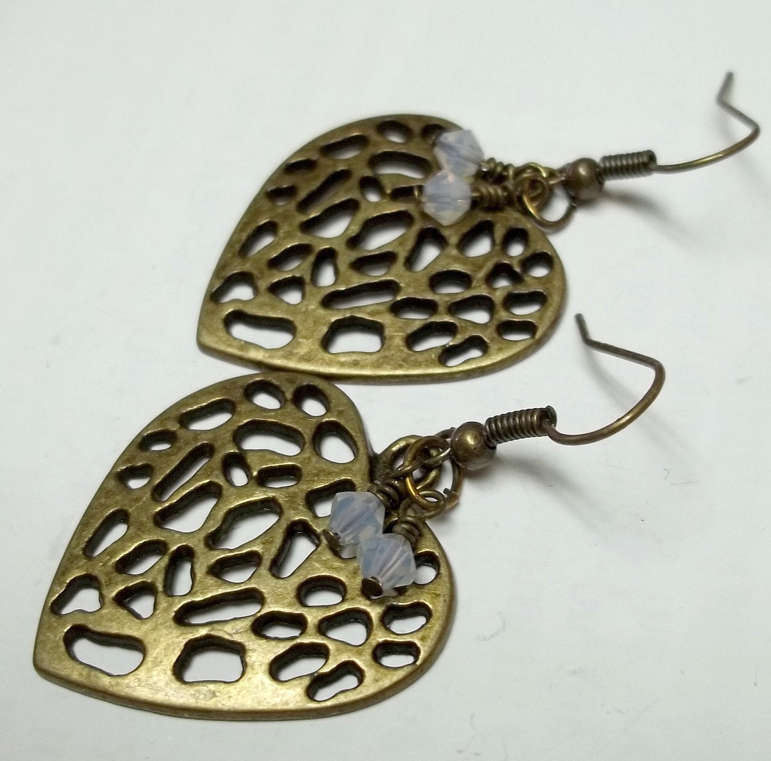 white swaroski crystal Antiqued brass heart earrings