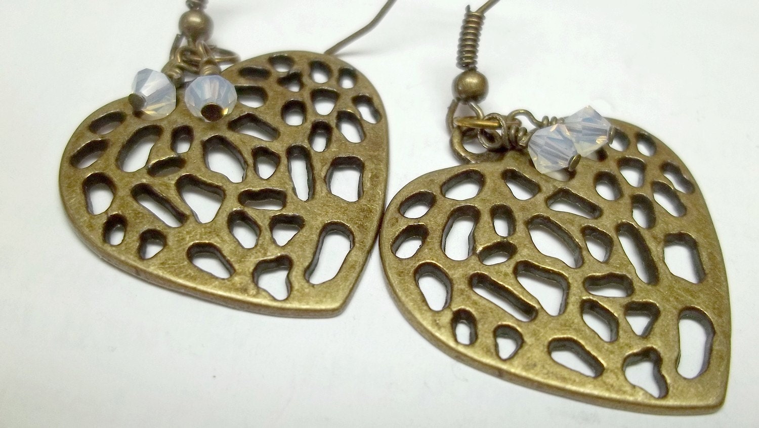 white swaroski crystal Antiqued brass heart earrings
