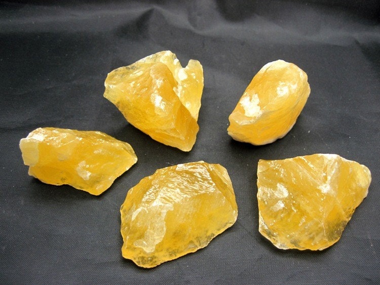 Two Rough Orange Calcite Crystals