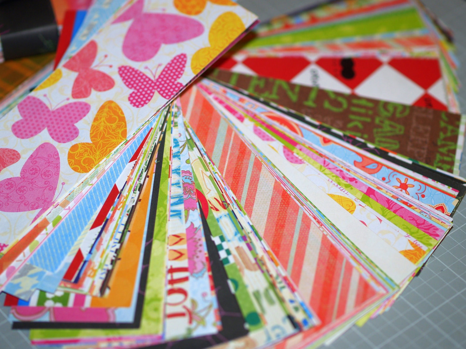 Scrap Paper Variety Pack ... 100 Pieces . 2" x 6" . Assortment . Variety . Polka Dot . Word . Geometric . Stripe . Floral . Embellishment