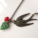 Flying Swallow - Antique Brass detail Swallow Charm and Czech Glass Leaf Necklace