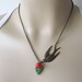 Flying Swallow - Antique Brass detail Swallow Charm and Czech Glass Leaf Necklace