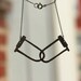 Bicycle Carcass Necklace (now in sterling silver)