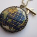 Travel the World. An Airplane and Globe Necklace. Earth Cameo Inlaid with Natural Gemstones and Shell. Long Necklace in Antique Gold Finish