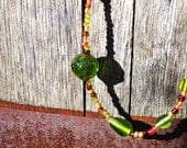 Glass bead necklace in natural greens and browns