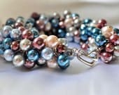 Gorgeous pearl dangle bracelet in blues and wines