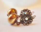 Gorgeous champagne pearl dangle earrings with copper fiilgree and crystal embellishment