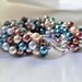 Gorgeous pearl dangle bracelet in blues and wines